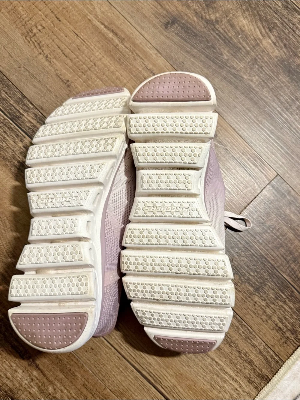 Light Pink Women's Glide-Step slip in Skechers